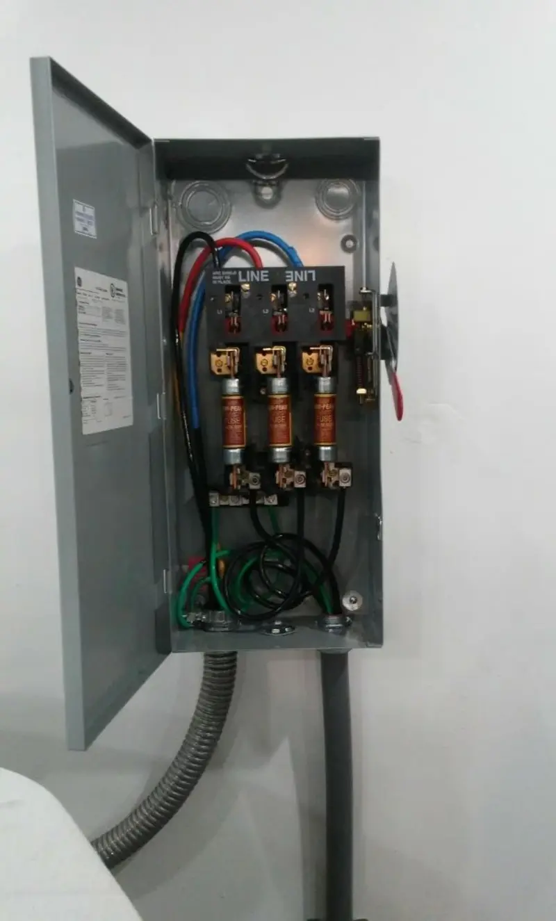 Three-phase disconnect switch installed for Smoke Detector Installation in Logan